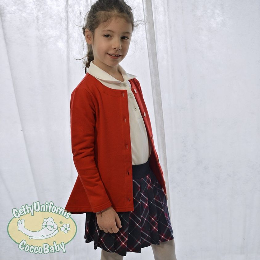 Golfino rosso con polo e gonna scozzese